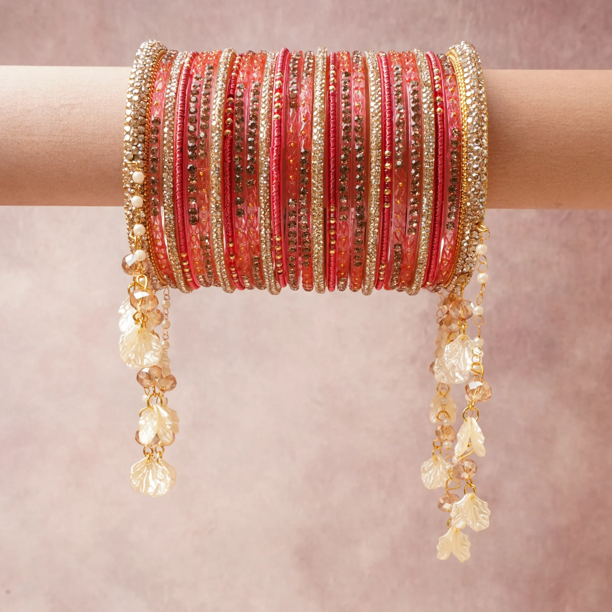 A commanding Deep Coral Red anchors this beautiful set, enriched with accents of Gold, Clear Diamond, Pearl White, Champagne, Translucent Ivory that add depth and dimension.

Featuring a striking composition of Glass, Fabric, Gold-toned Metal, Rhinestones, Glass Seed Beads, Pearls, Faceted Crystal, Acrylic, this set carries intricate craftsmanship and strong presence. Grand in form, it is created for moments that deserve to be marked.